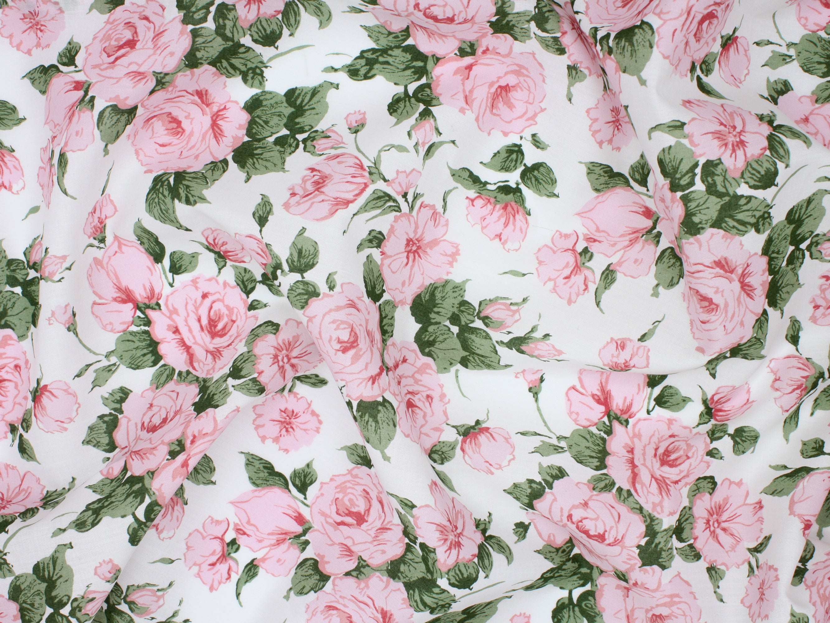 Clarabell A Liberty Fabrics Tana Lawn Cotton Print | Holme & Moss Fabric Shop | Floral fabric with pink roses and green leaves on an off-white background