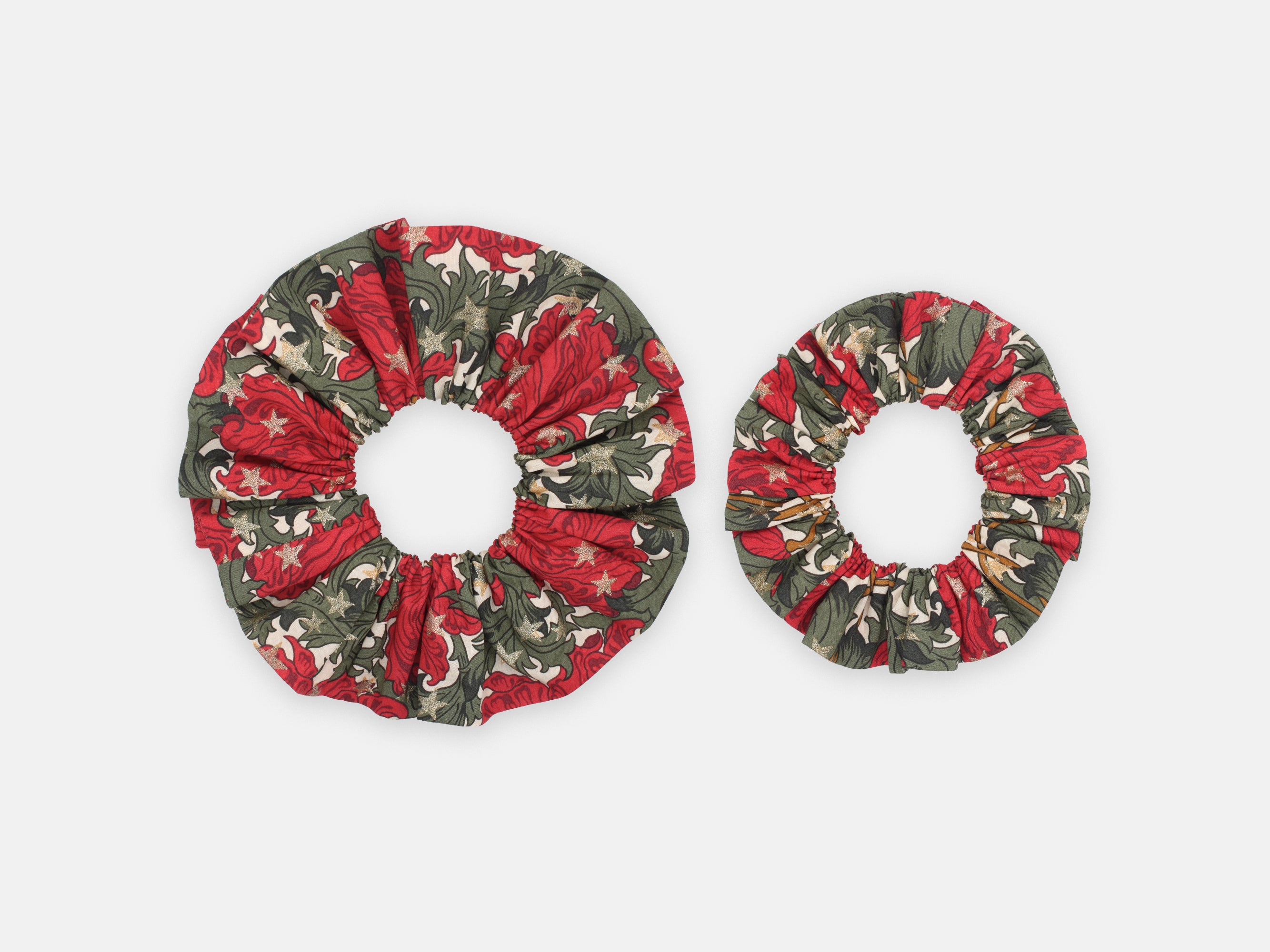 Festive Liberty print scrunchies in rich red and green, scattered with shimmering gold stars | Large and medium scrunchies - Liberty Merry Reverie Print | Holme & Moss
