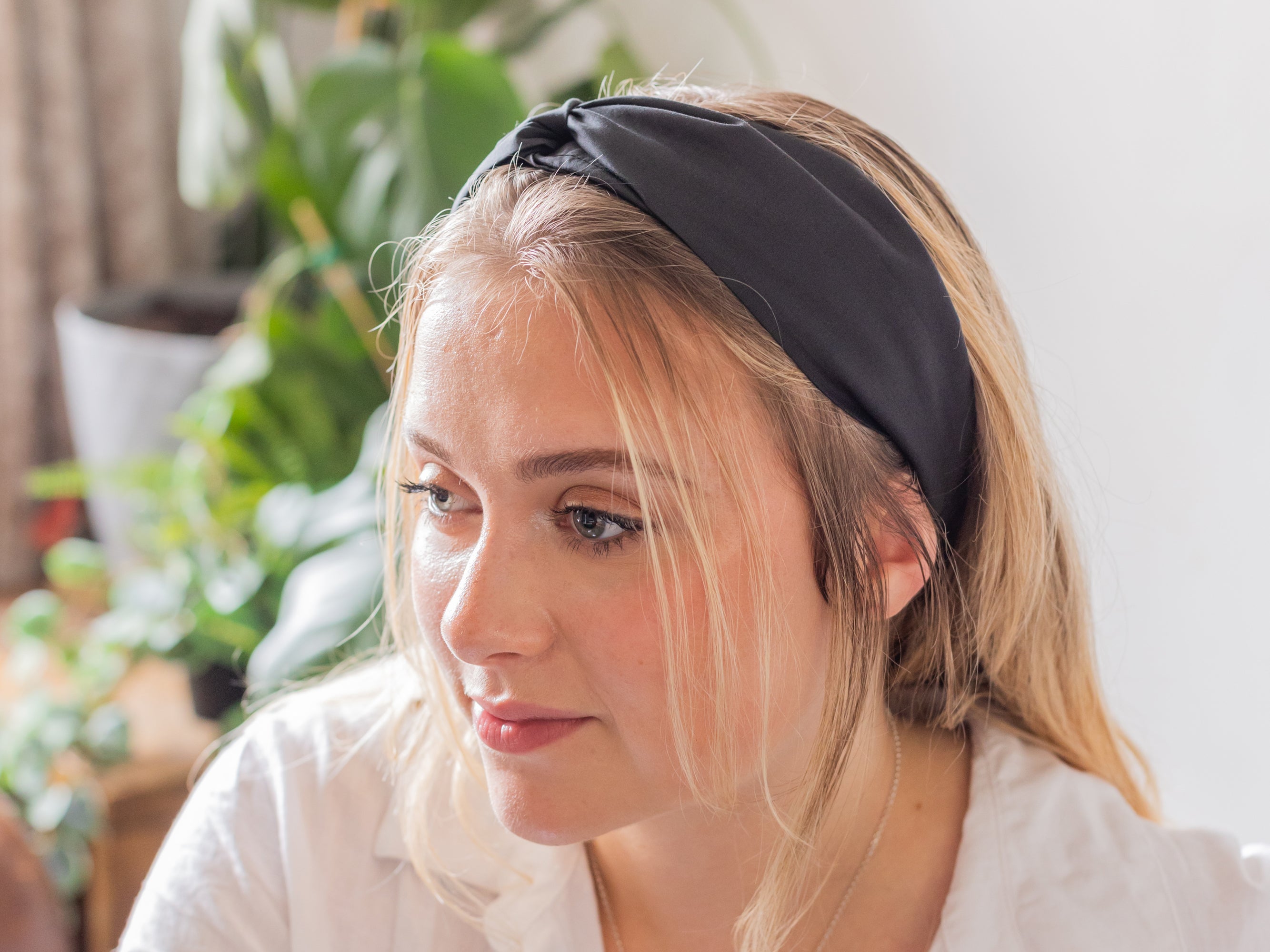 Model Wearing Black Twist Headband, Liberty London Print | Holme & Moss