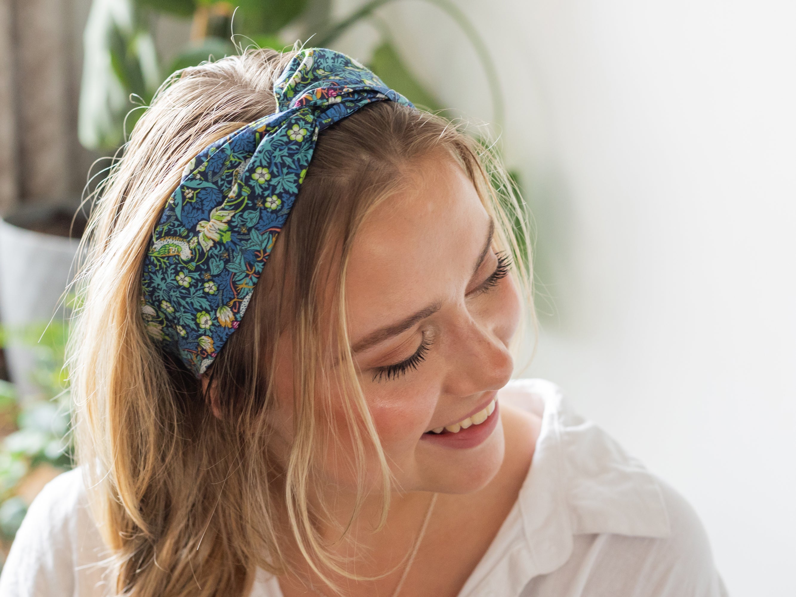 Model wearing twist Headband, Liberty London Strawberry Thief J Print | Holme & Moss