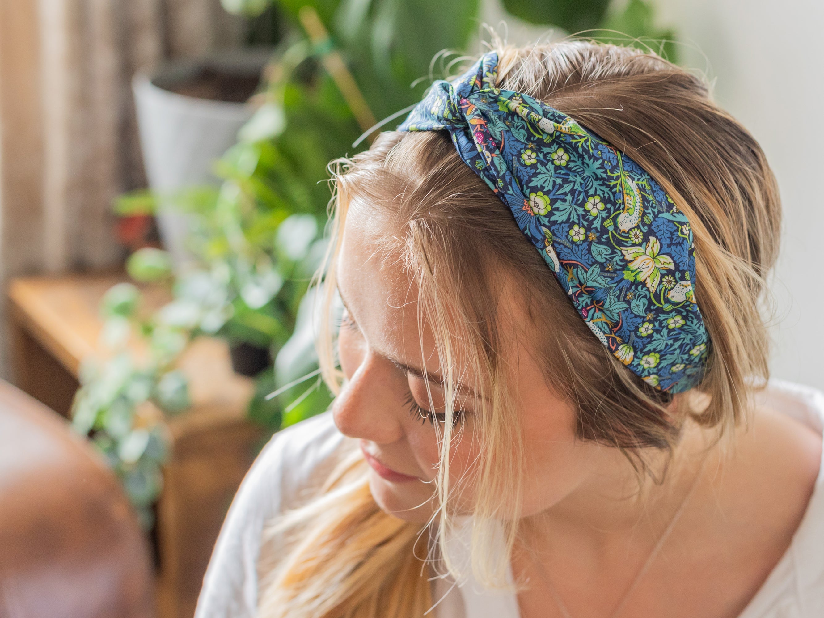 Model Wearing Twist Headband, Liberty London Print | Holme & Moss