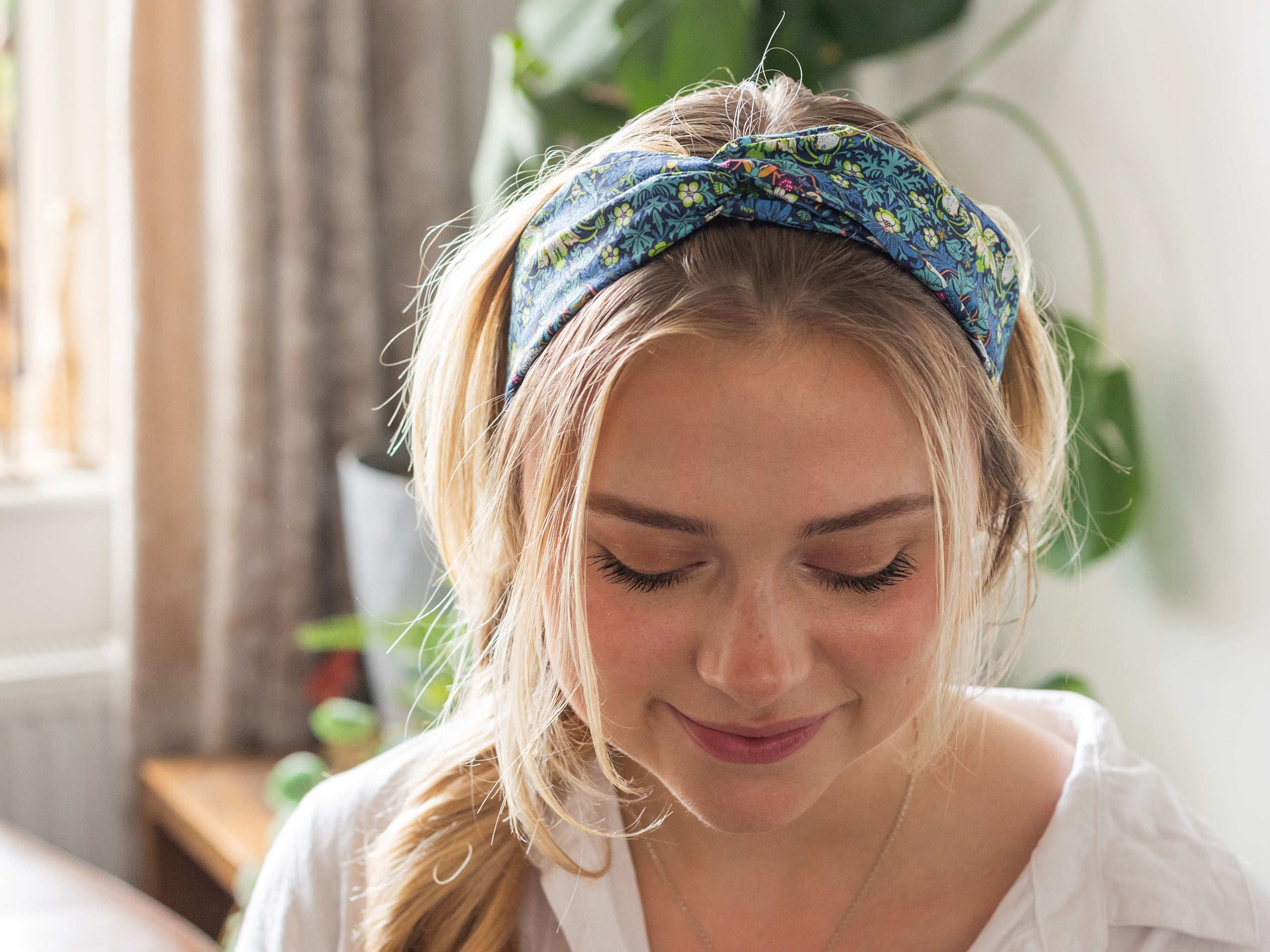 Model Wearing Twist Headband, Liberty London Print | Holme & Moss