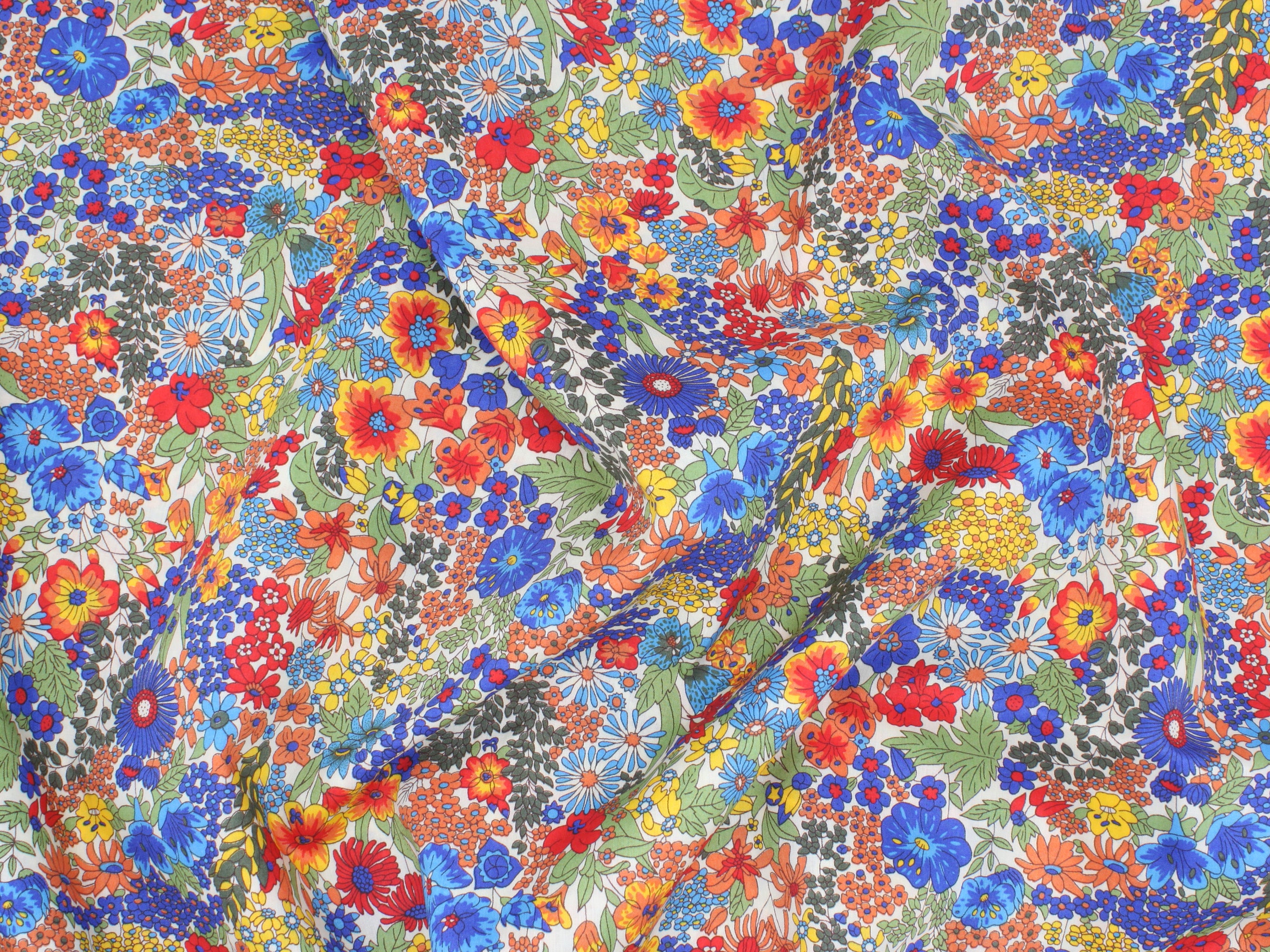 Colourful floral pattern with red, blue, and yellow flowers | Liberty Fabrics - Margaret Annie A Tana Lawn™ Cotton | Holme & Moss