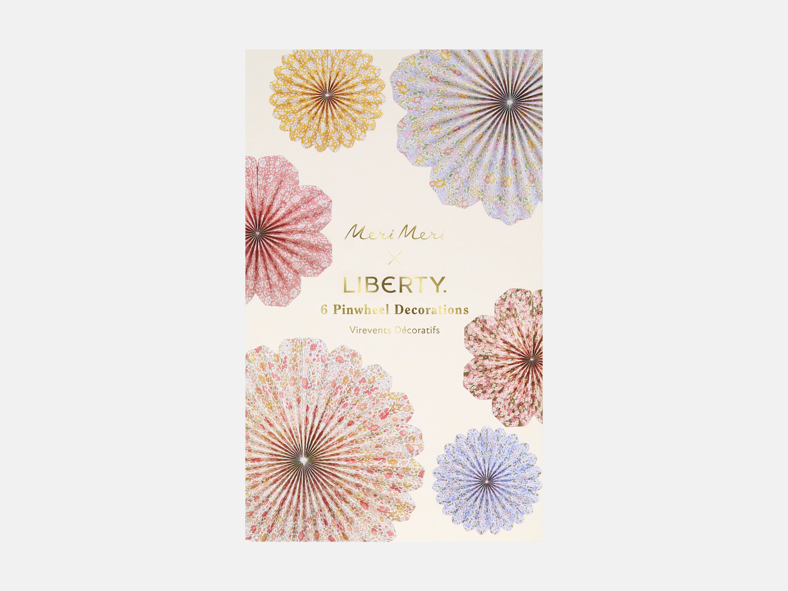 Packaging of Liberty pinwheel decorations with colourful Liberty print designs on a white background | Meri Meri x Liberty Paper Pinwheel Decorations (6) | Holme & Moss
