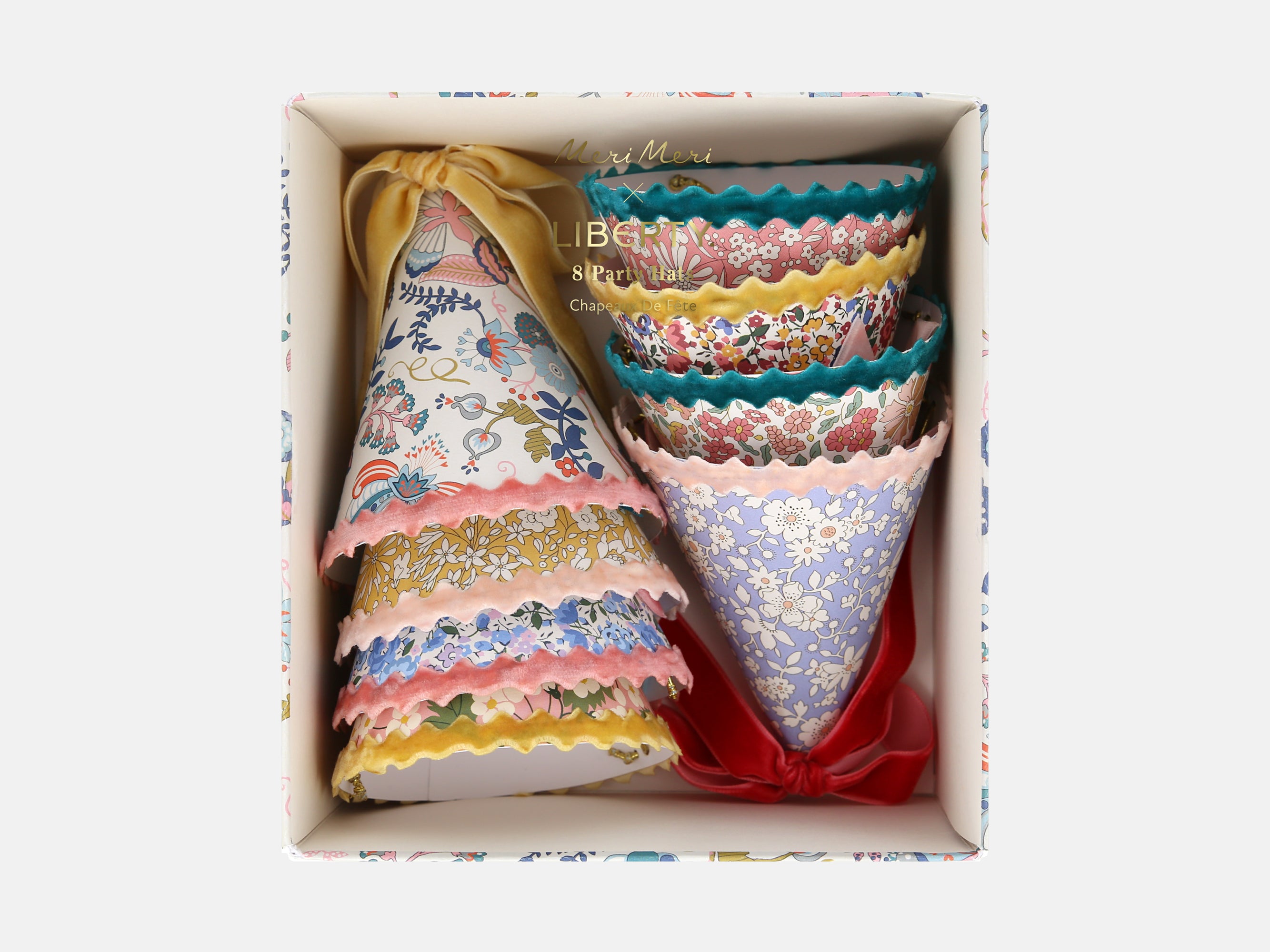 Decorative Liberty print party hats with colourful velvet ribbons in box | Meri Meri x Liberty 8 Party Hats | Holme & Moss