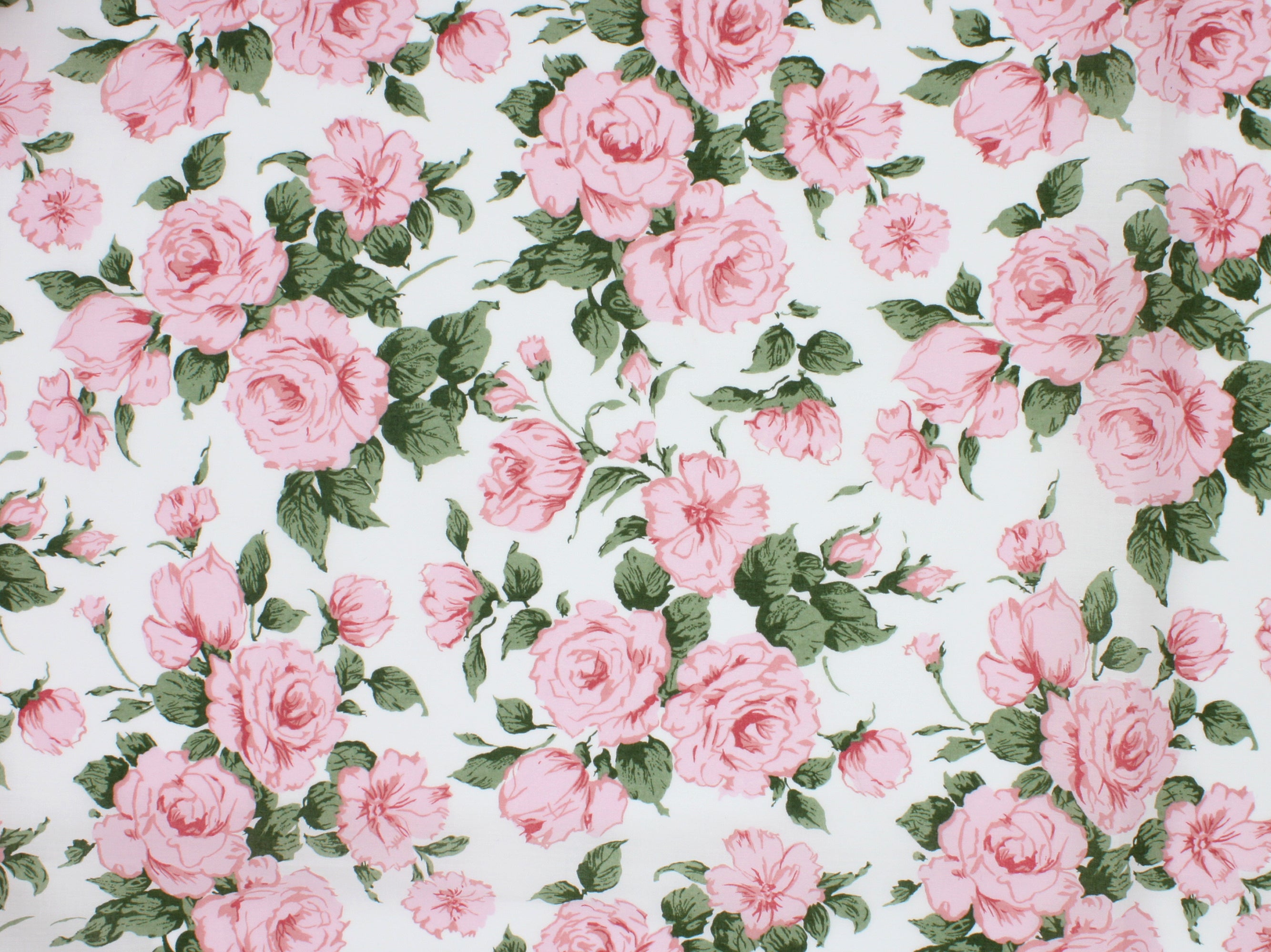 Clarabell A Liberty Fabrics Tana Lawn Cotton Print | Holme & Moss Fabric Shop | Floral fabric with pink roses and green leaves on an off-white background