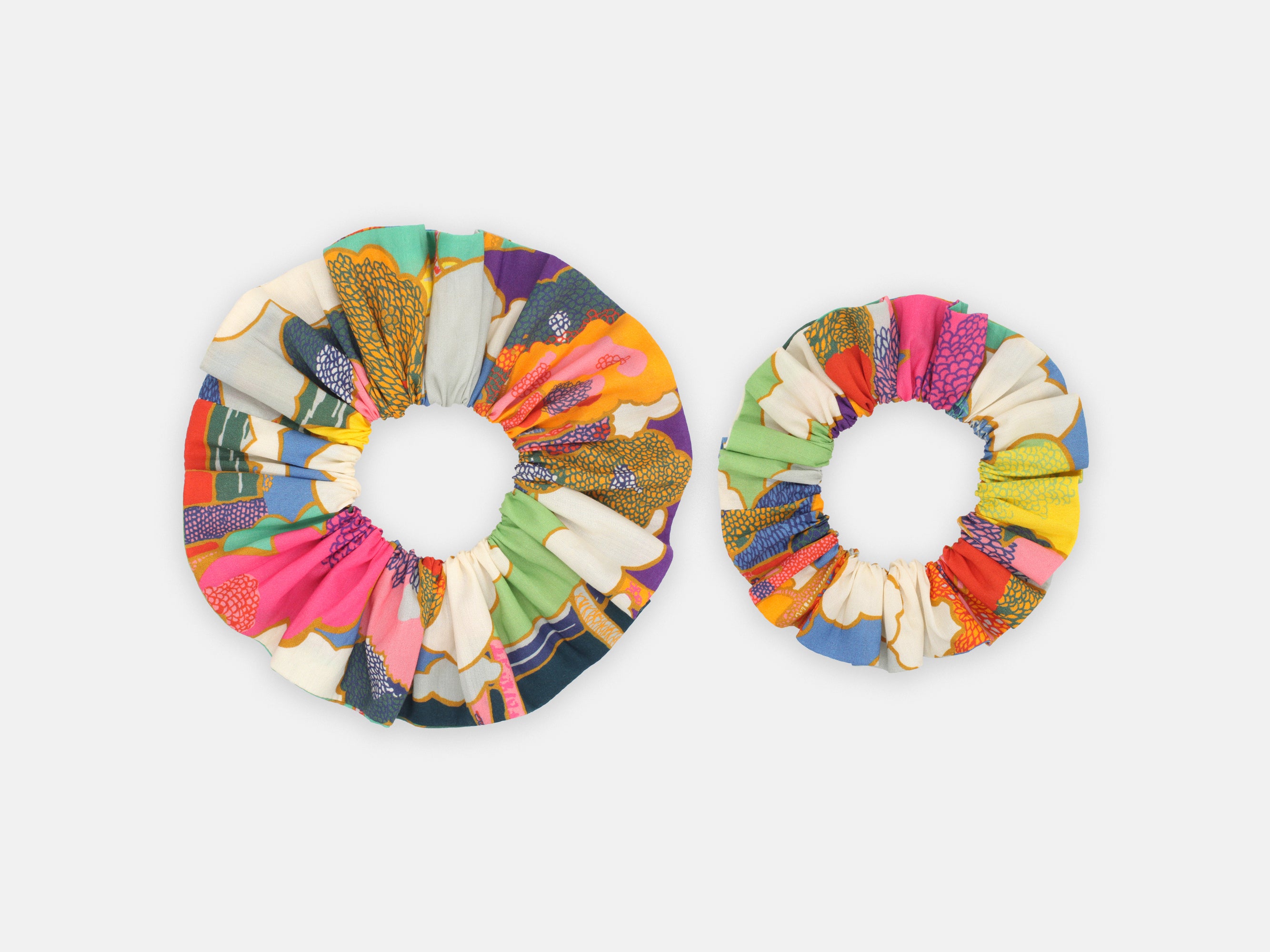 Multi-coloured fabric scrunchies on a white background | Large and Medium Scrunchie - Liberty Fabrics Prospect Road A Print | Holme & Moss