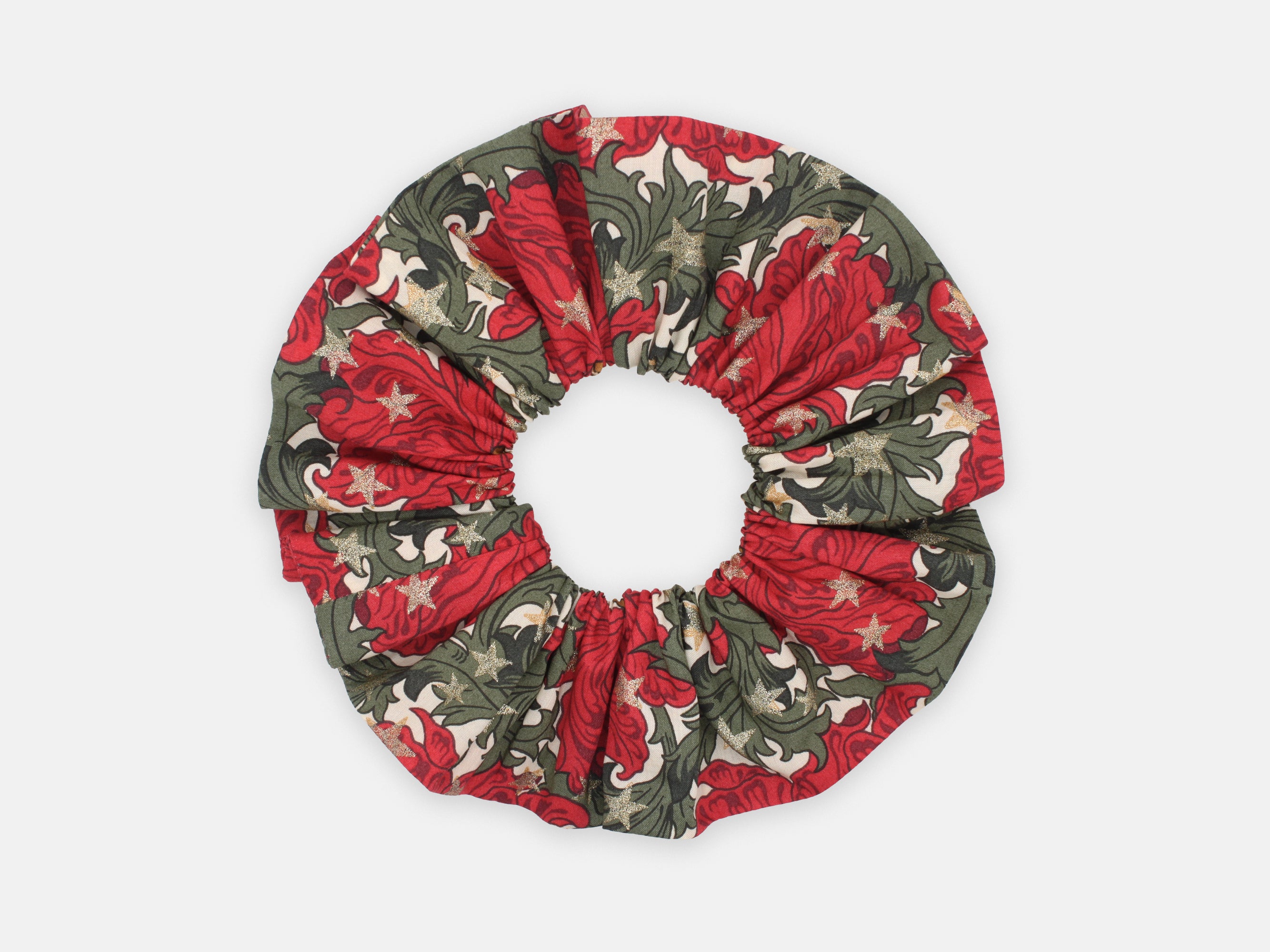 Festive Liberty print scrunchie in rich red and green, scattered with shimmering gold stars | Large scrunchie - Liberty Merry Reverie Print | Holme & Moss