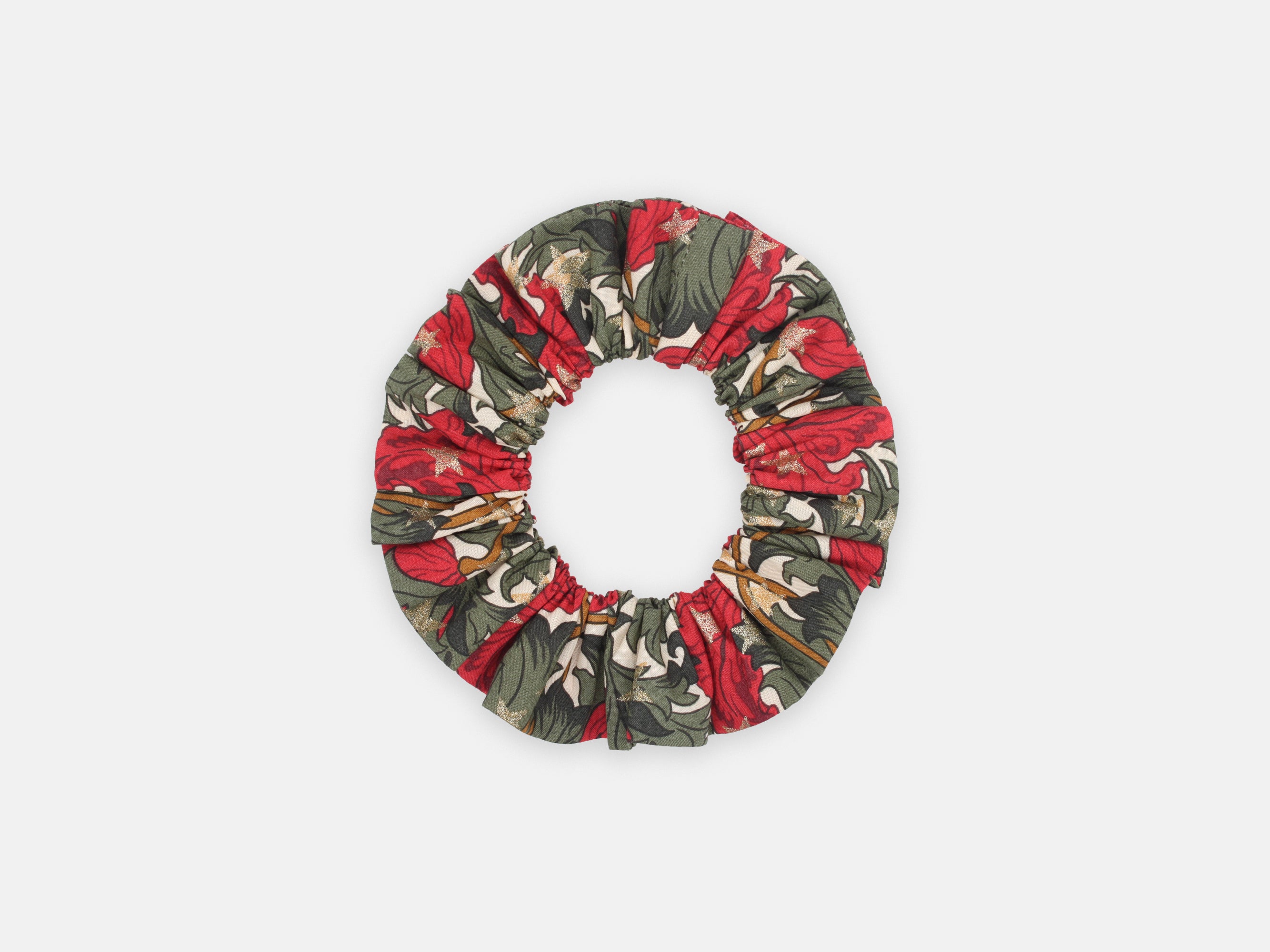 Festive Liberty print scrunchie in rich red and green, scattered with shimmering gold stars | Medium scrunchie - Liberty Merry Reverie Print | Holme & Moss