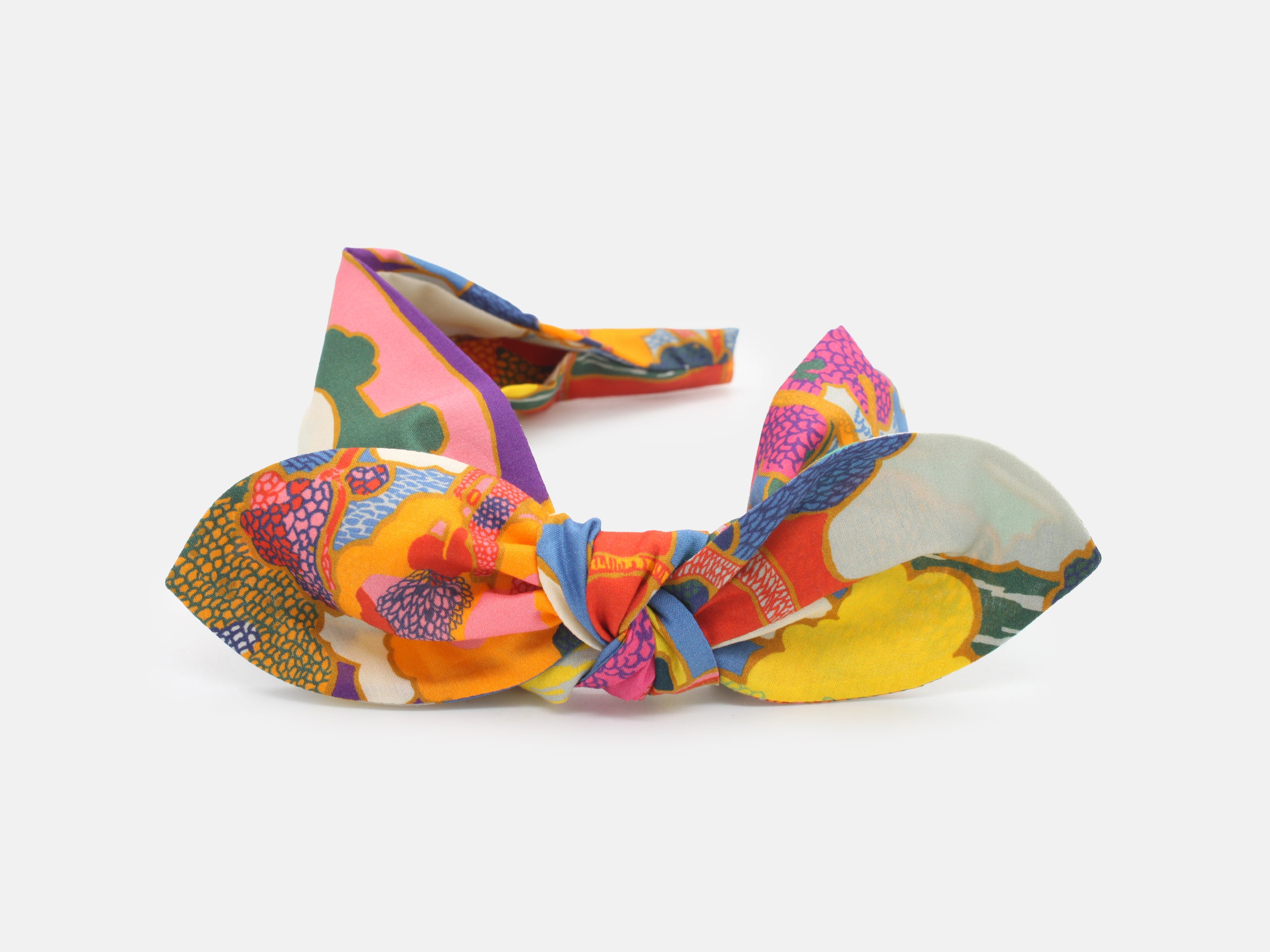 Colourful patterned headband on a white background | Liberty Fabrics Prospect Road A Print Side Bow Headband | Holme & Moss