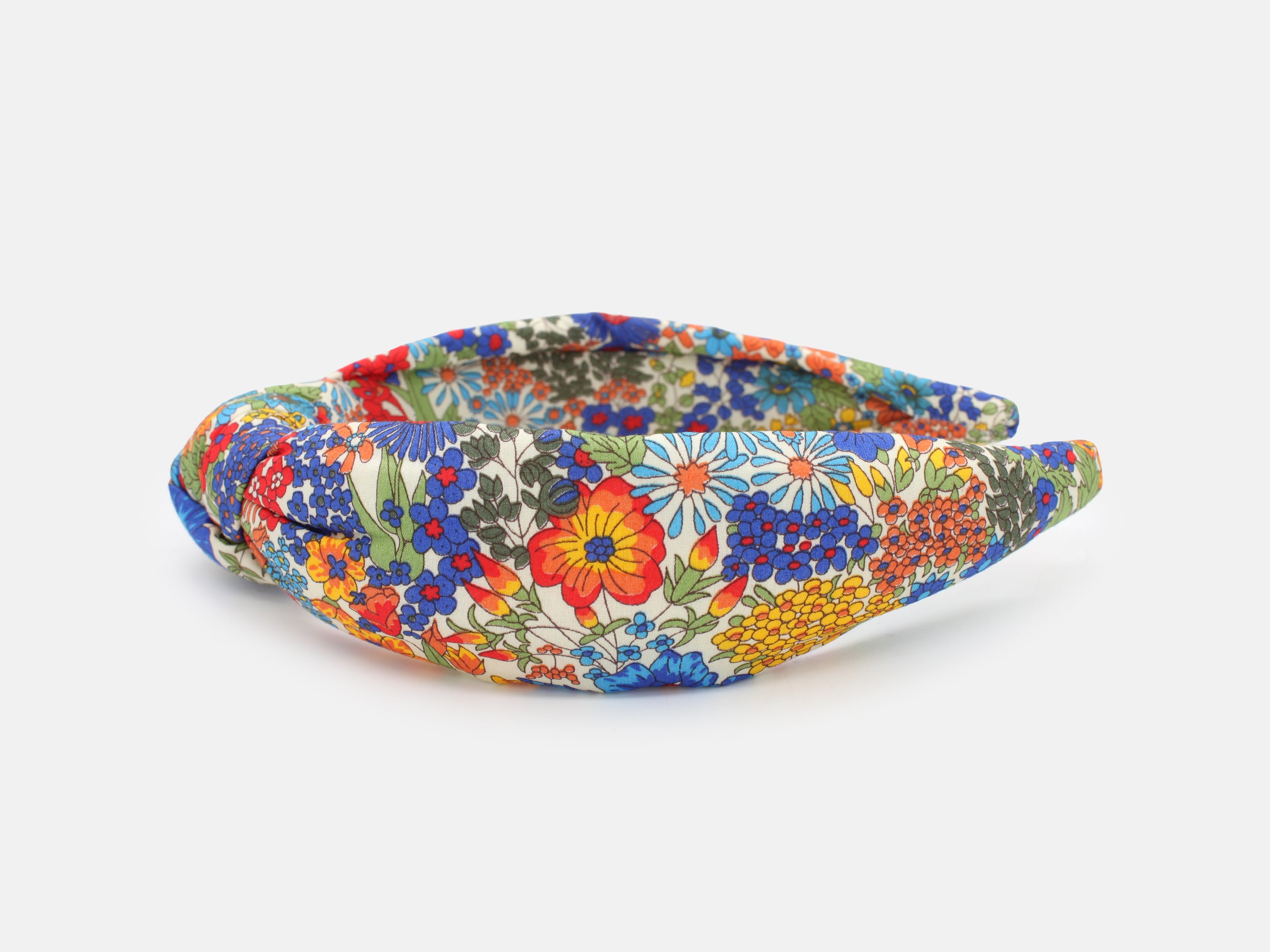 Colourful floral-patterned headband on a cream background | Liberty Fabrics Margaret Annie A Padded Knot Headband | Holme & Moss