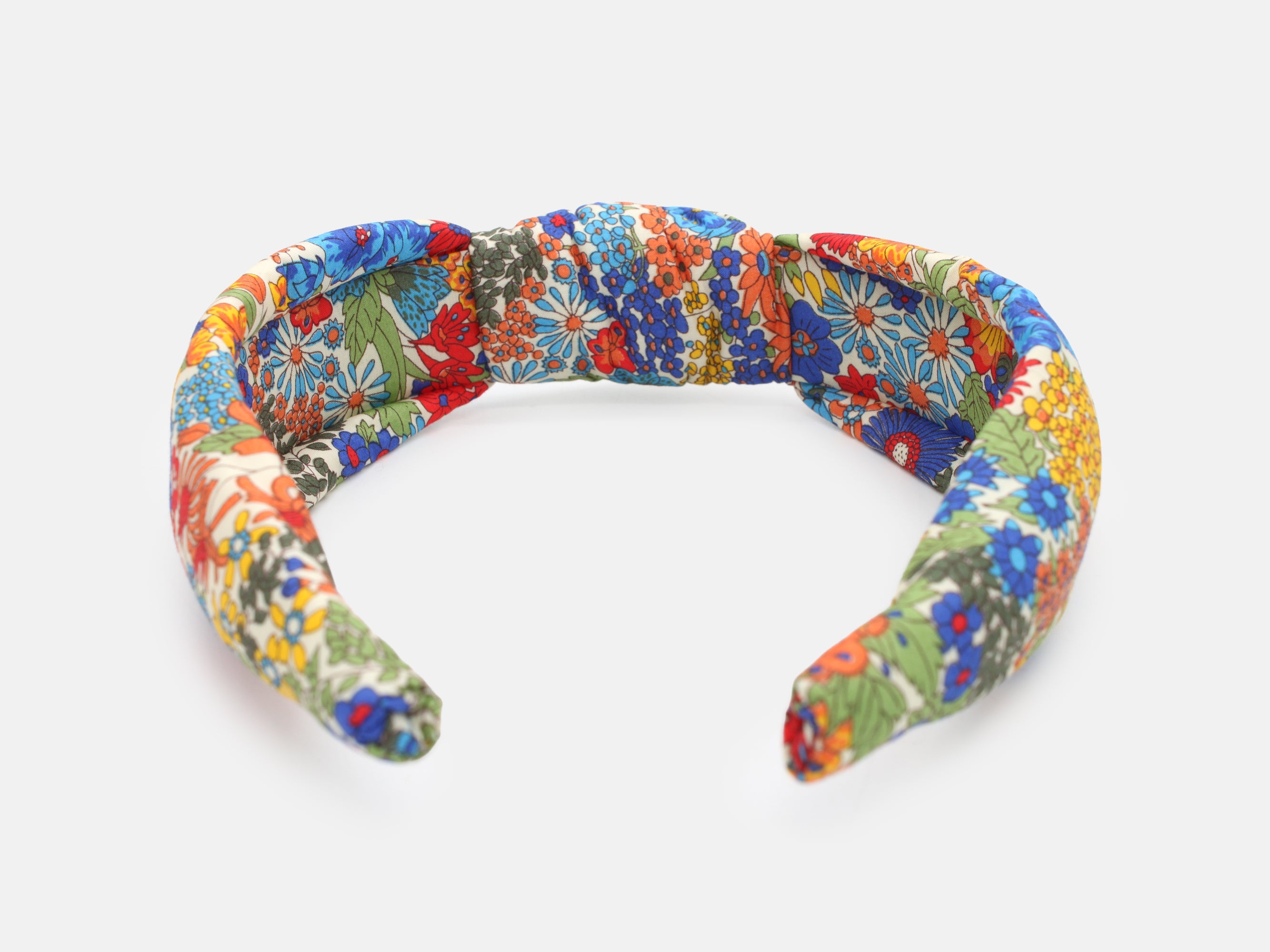 Colourful floral-patterned headband on a cream background | Liberty Fabrics Margaret Annie A Padded Knot Headband | Holme & Moss
