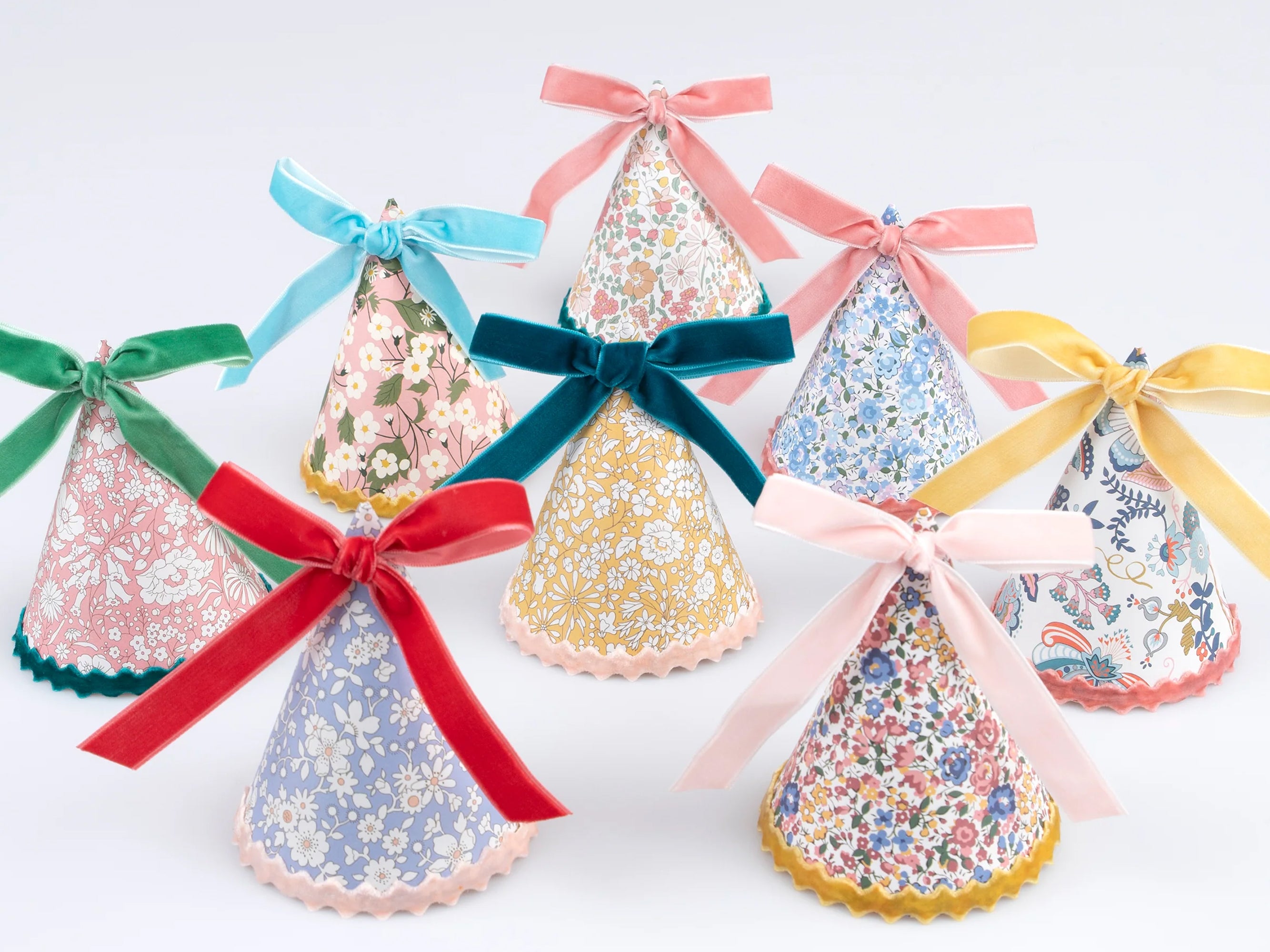 Decorative party with colourful velvet ribbons on a white background Meri | Meri x Liberty 8 Party Hats | Holme & Moss