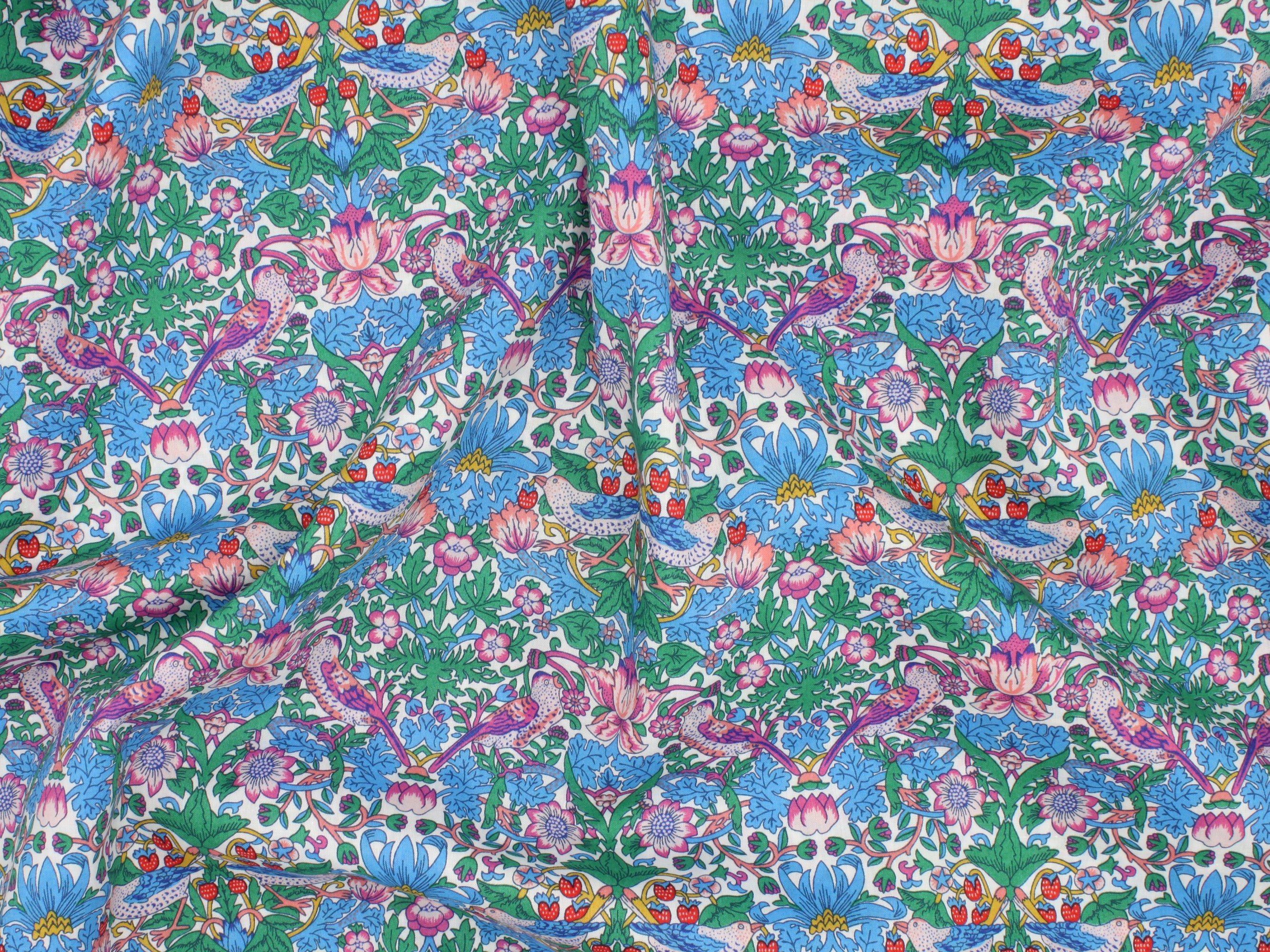 William Morris patterned fabric with a colourful design of flowers and birds | Liberty Fabrics - Strawberry Thief Spring F Tana Lawn™ Cotton | Holme & Moss